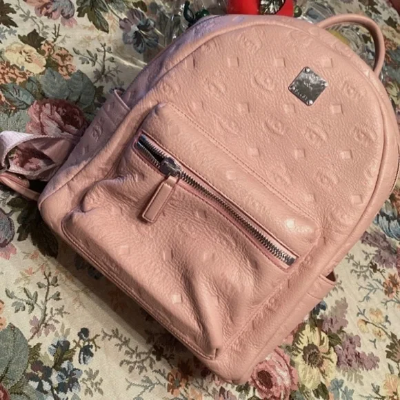 MCM | Bags | Mcm Monogram Embossed Leather Ottomar Backpack  display picture 1